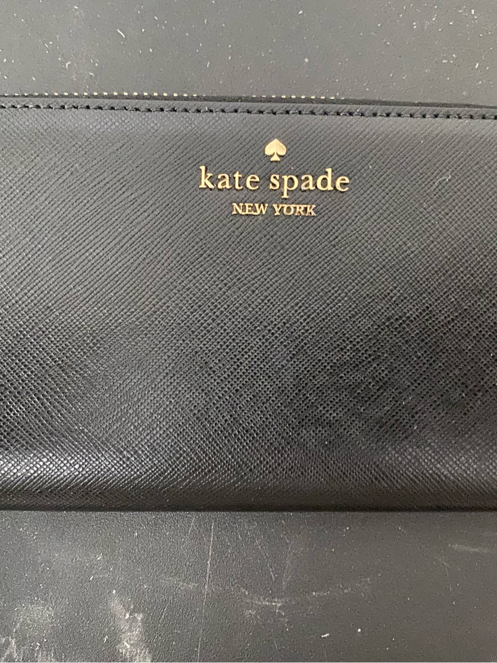 kate spade Black Saffiano Zip-Around Wallet with Gold Logo